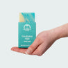 Hand holding a bar of Eucalyptus Mint Natural Essential Oil Soap Bar