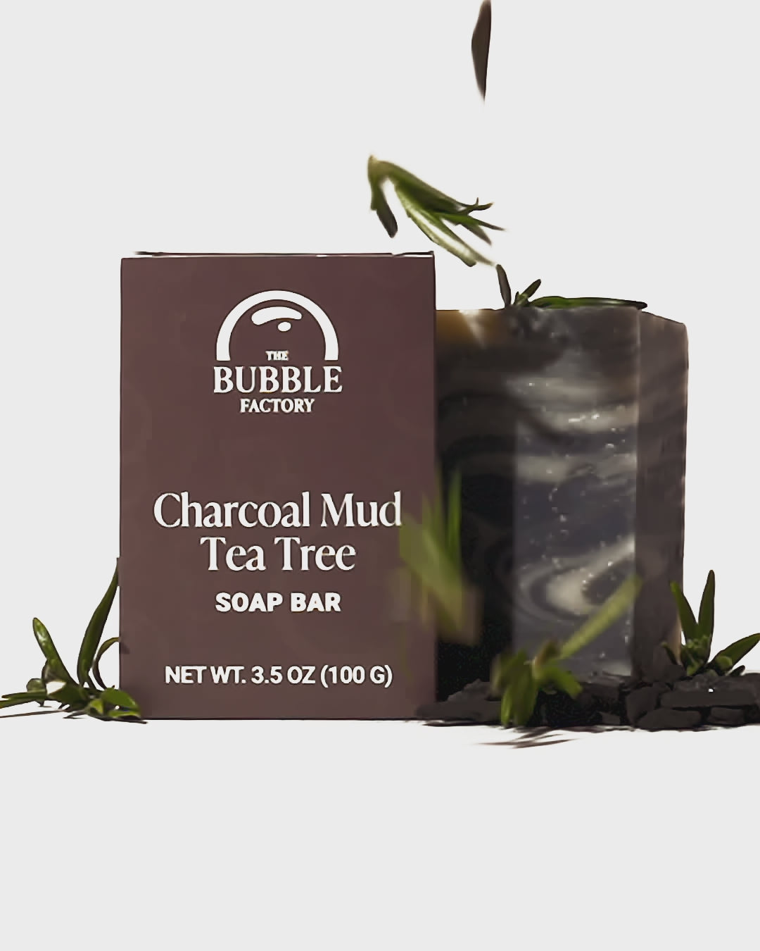 Charcoal Mud Tea Tree Soap Bar, Front view Animation with Leaves and Charcoal